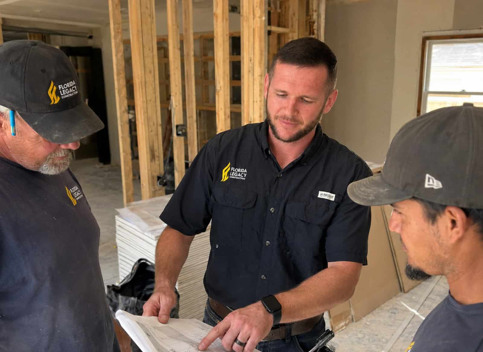Travis Strickland, owner of Florida Legacy Construction, walking a remodeling project in Ocala FL