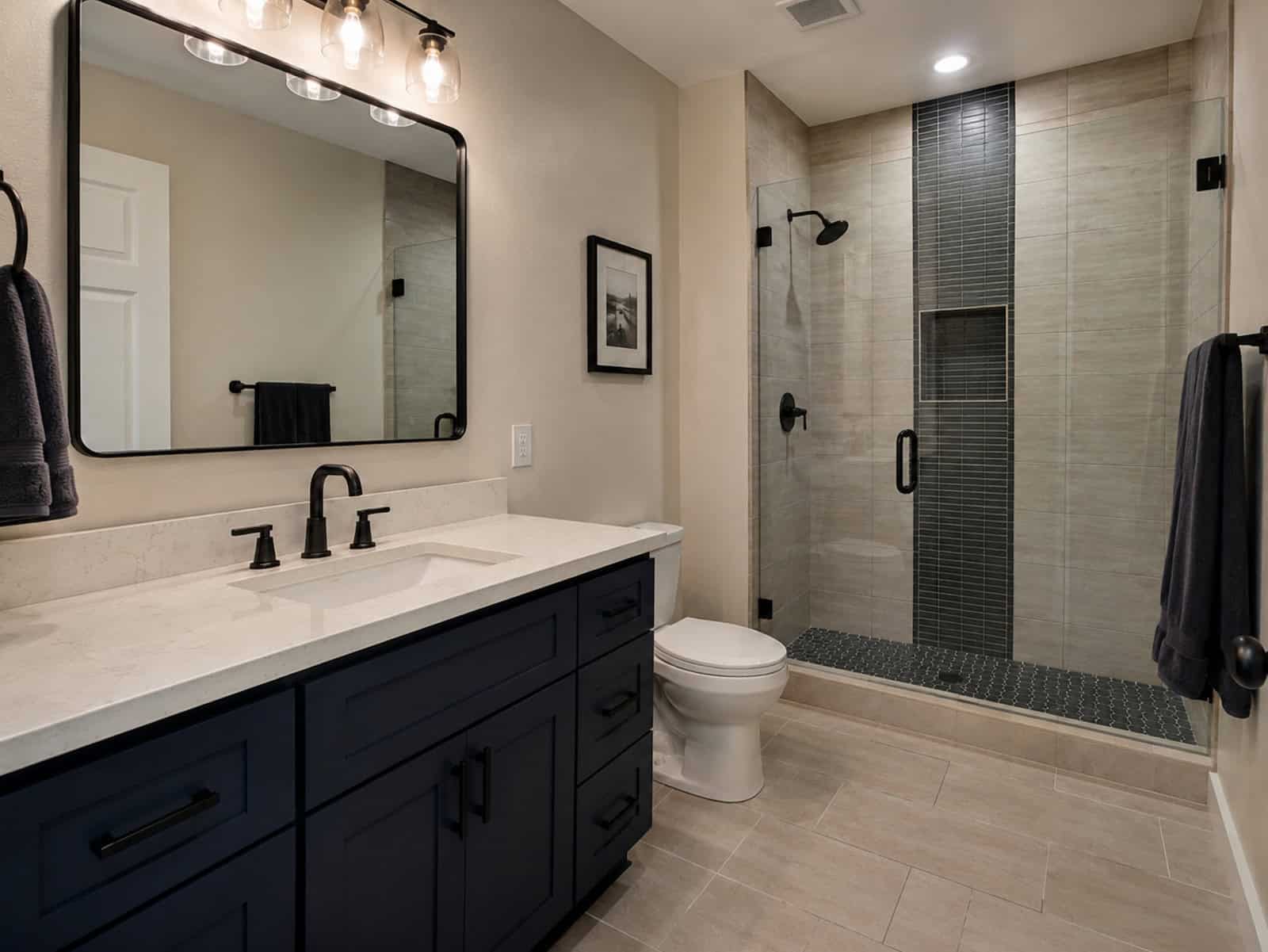 Bathroom remodel with navy vanity and walk-in shower in Ocala FL