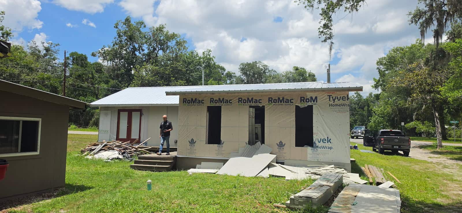 Residential exterior renovation with metal roof in Central Florida