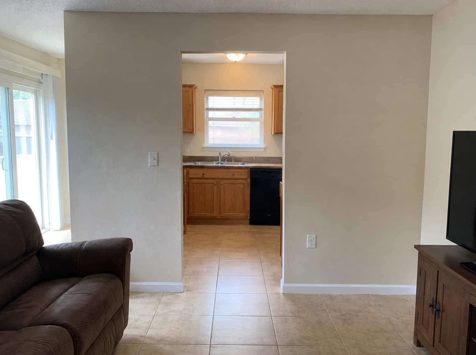 Closed off kitchen with a load-bearing wall before removal in Ocala, FL